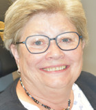 Bidhævning løftede smilet hos Merete